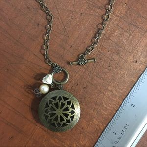Aromatherapy Bronze Colored Locket Necklace